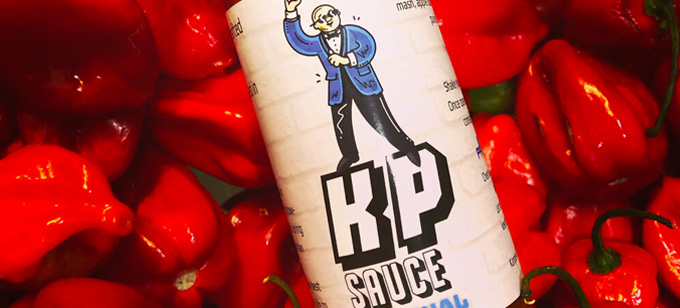 KP original hot sauce on a bed of chillis