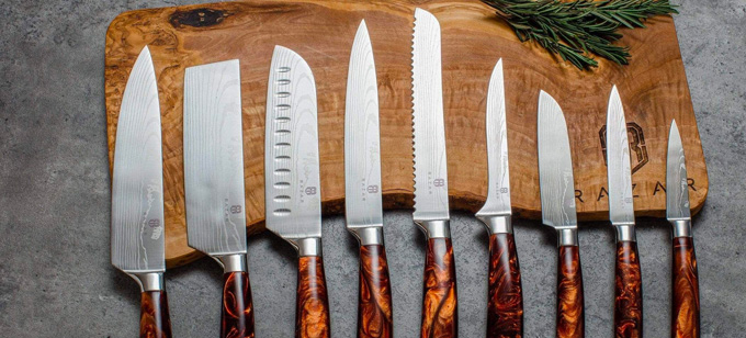 hand made Razar knives on chopping block